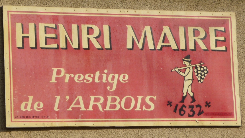 Old sign for Henri Maire